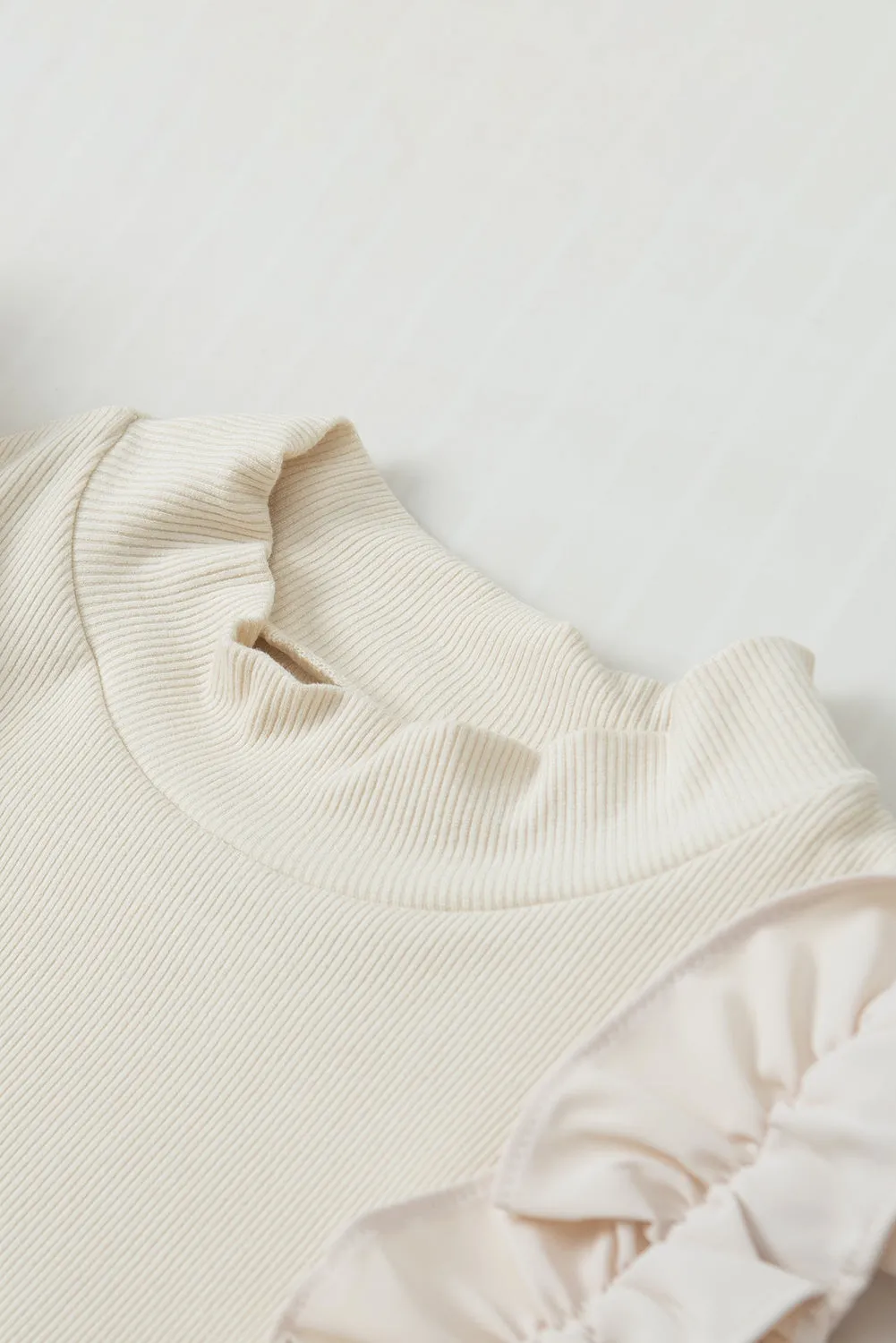 Beige Ruffle Flutter Sleeve High Neck Ribbed Blouse
