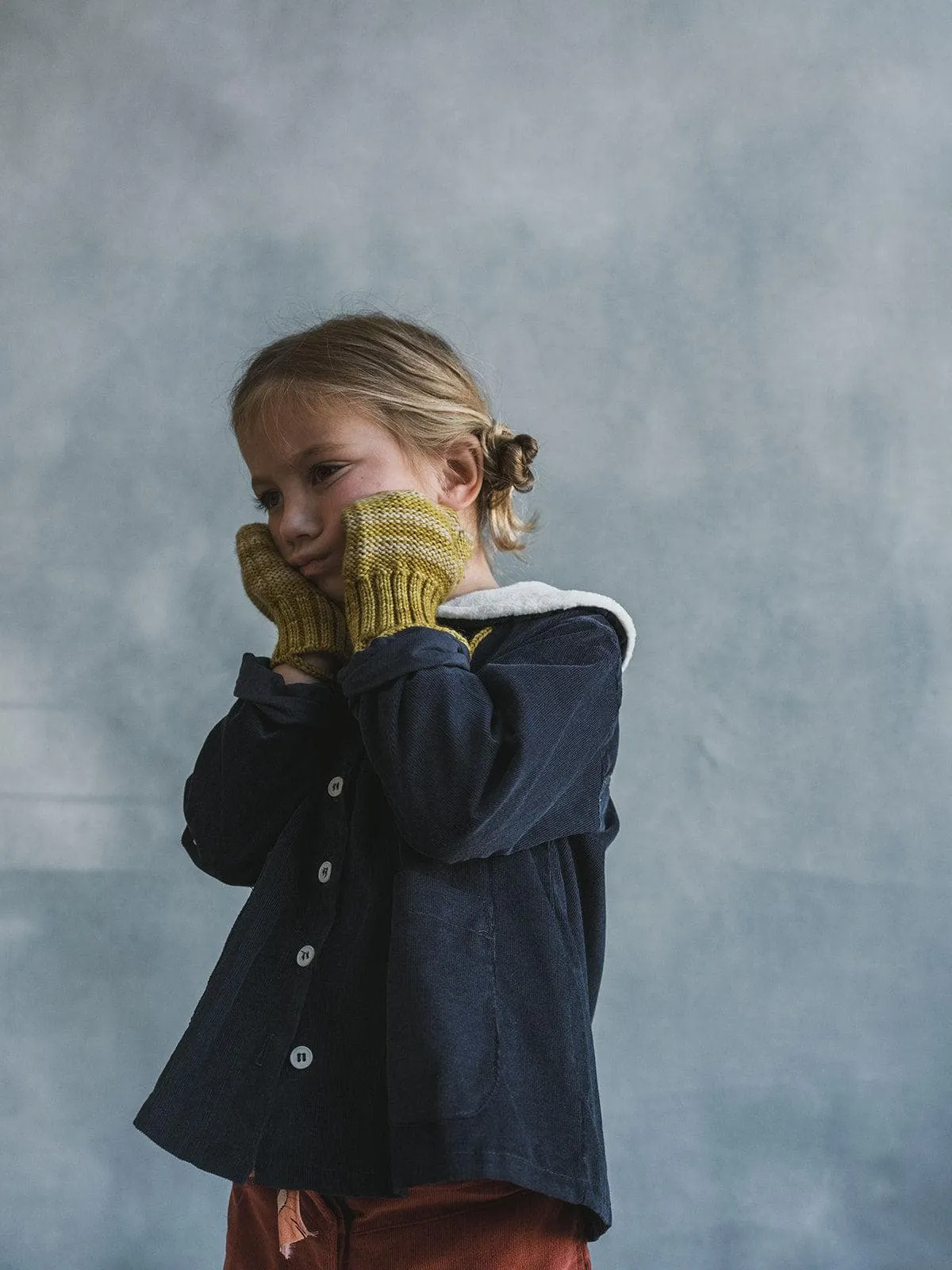 handknit striped mittens in chartreuse